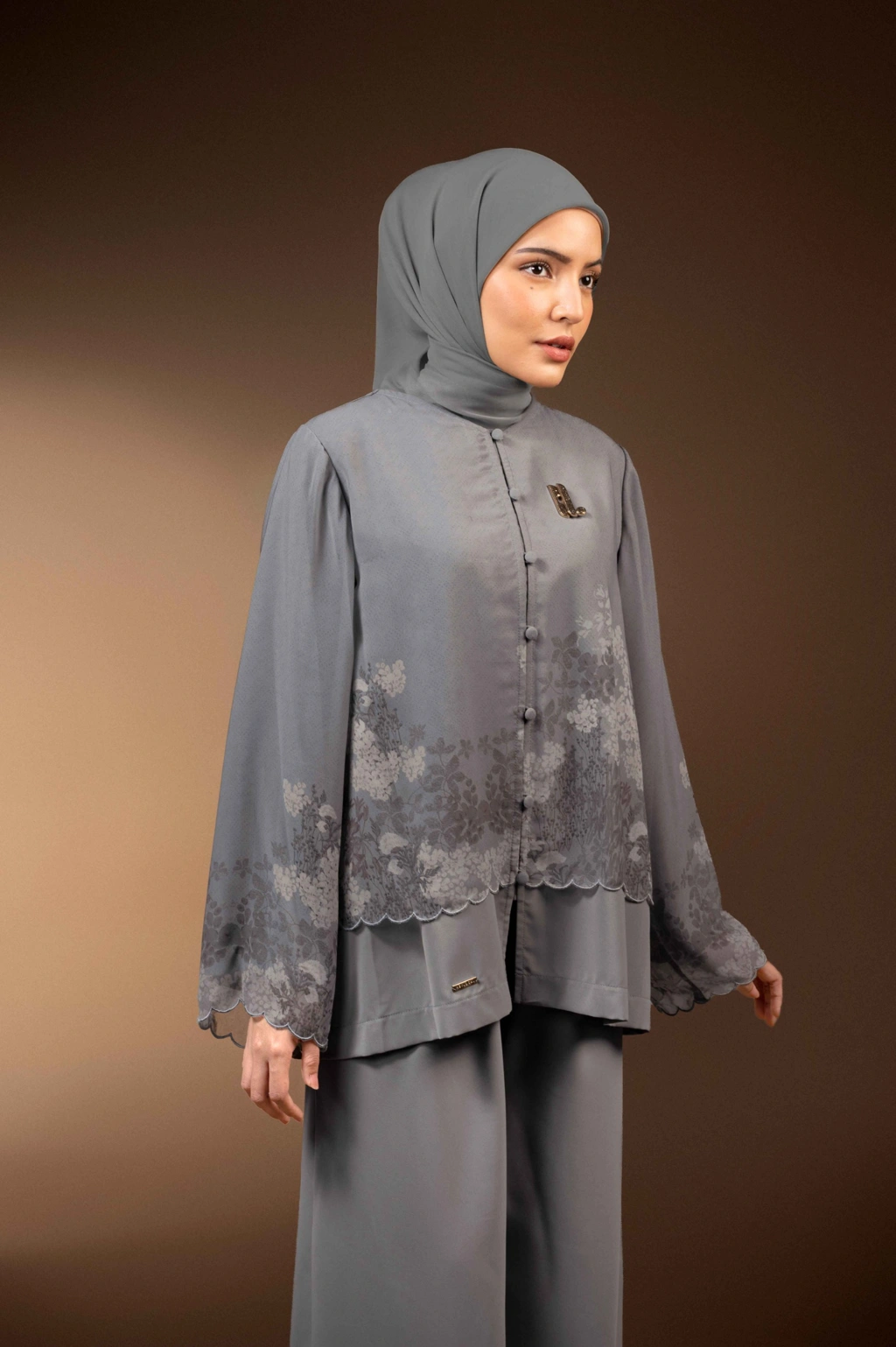 BLUS BERMOTIF TENTREM KELABU